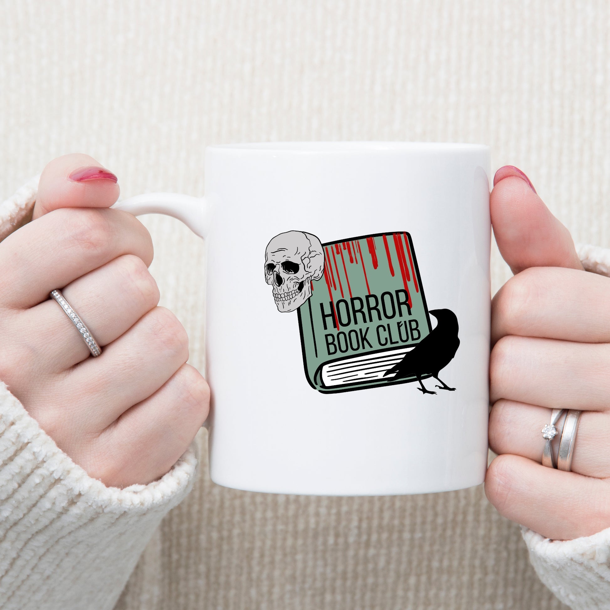 Two hands holding the Horror Book Club Mug | Bookish Halloween | Ink & Stories