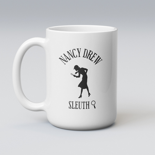 White mug with Nancy Drew Sleuth silhouette design on a gray background
