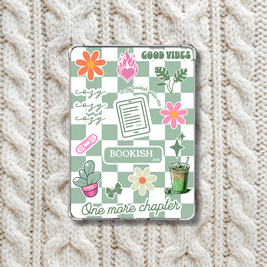 Cozy Matcha Green checkered Kindle Insert for Clear Case on a white knitted blanket