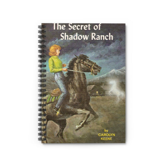 This Nancy Drew bookish notebook features the classic book cover design of The Secret of Shadow Ranch by Carolyn Keene. Designed by Starlit Prose Bookish Merch Australia.