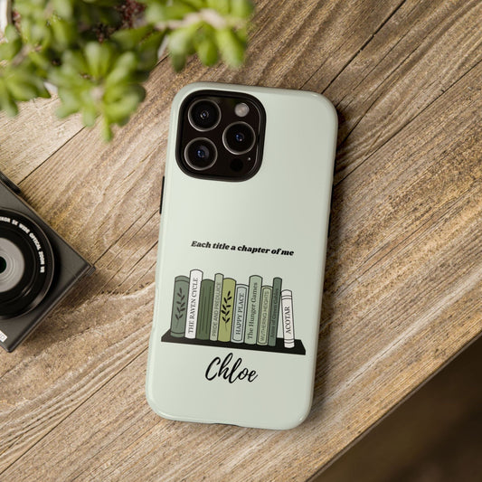 A mockup of a green custom bookshelf phone case with her name and fave books | Starlit Prose bookish merch