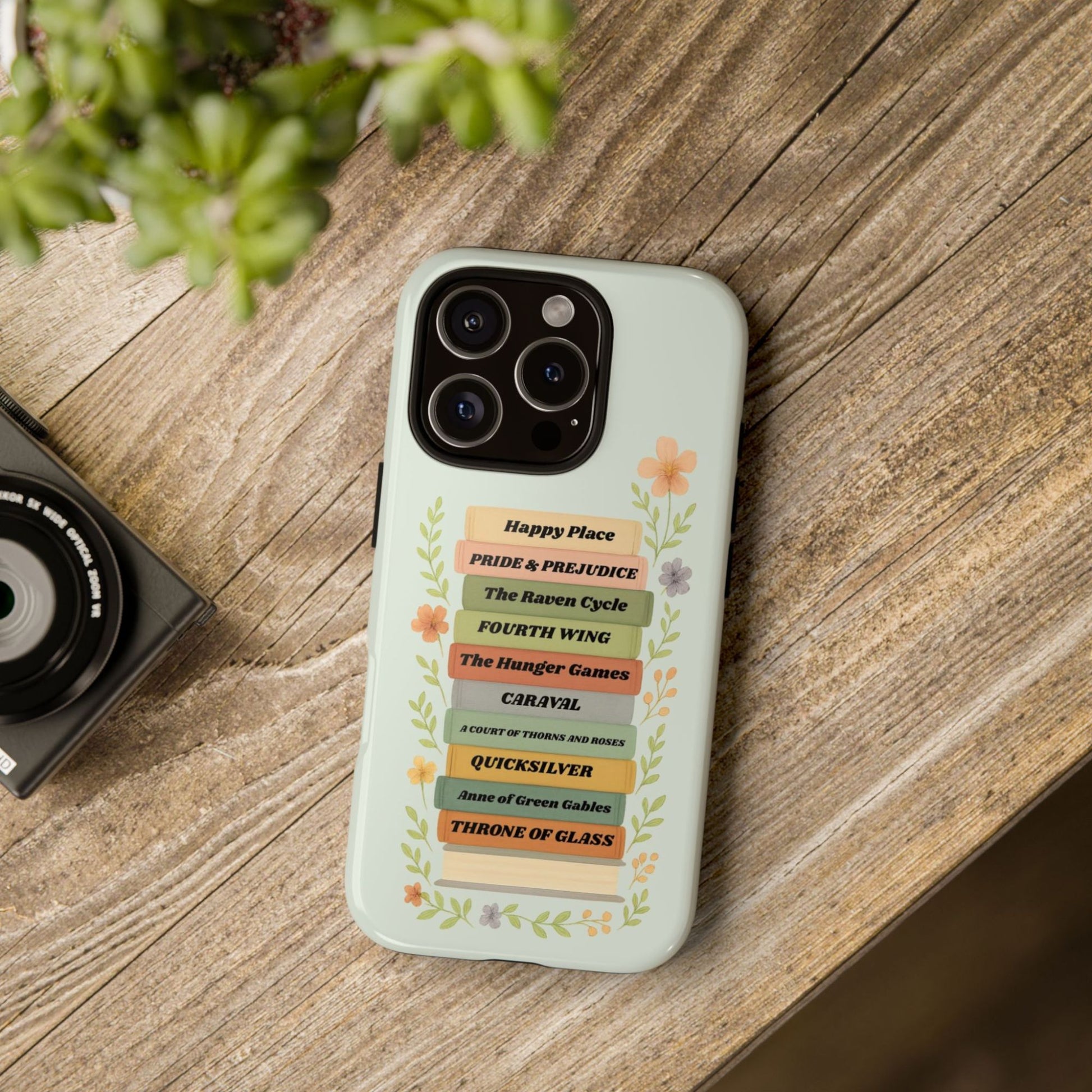 Personalised Bookshelf tough phone case case mocked up on a wooden. background | Starlit Prose bookish merch