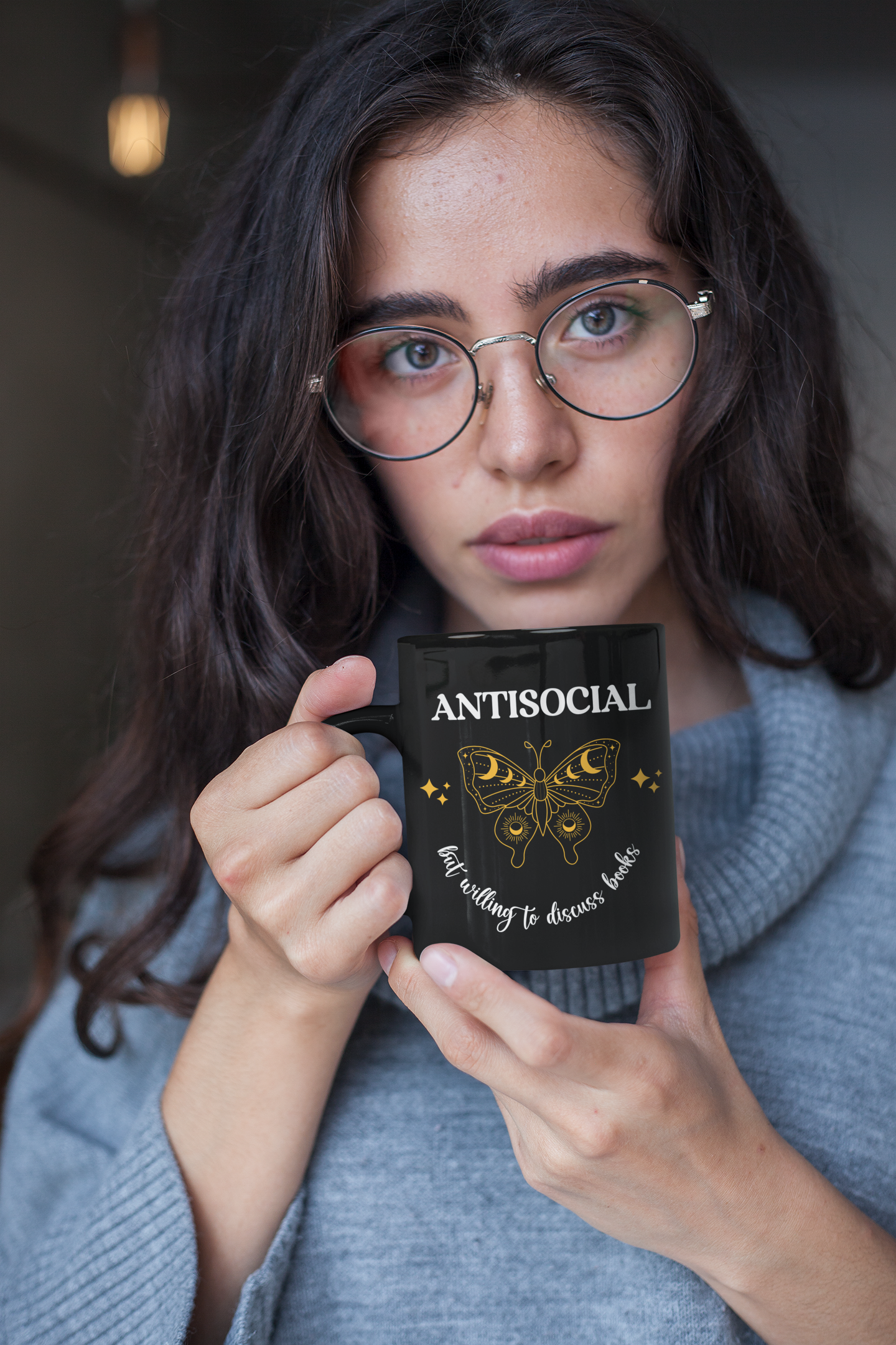 Mockup of Woman holding Antisocial Book Club Black Mug