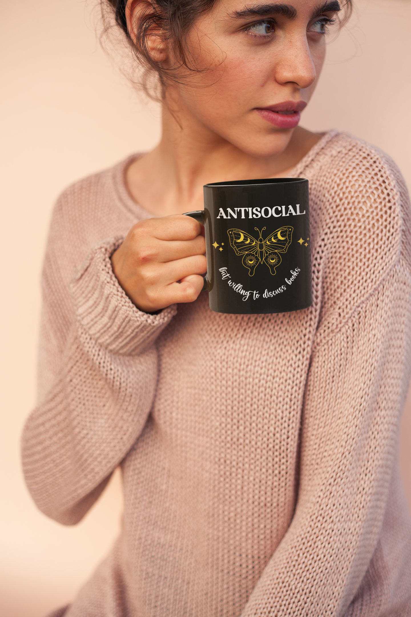 Mockup of Woman in sweater holding Antisocial Book Club Black Mug