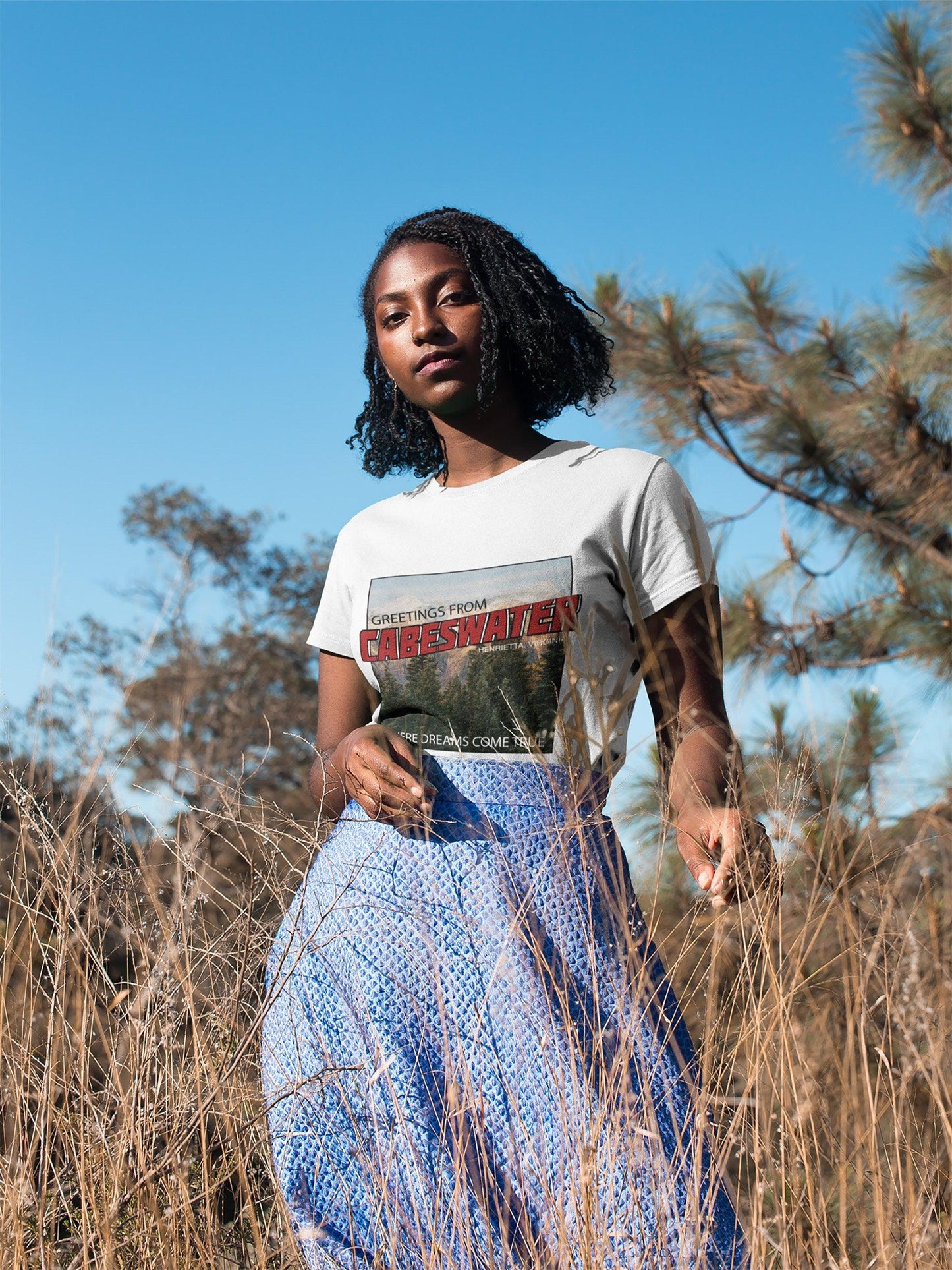 Cabeswater T-Shirt Raven Cycle White Ink and Stories Mockup outdoors 2