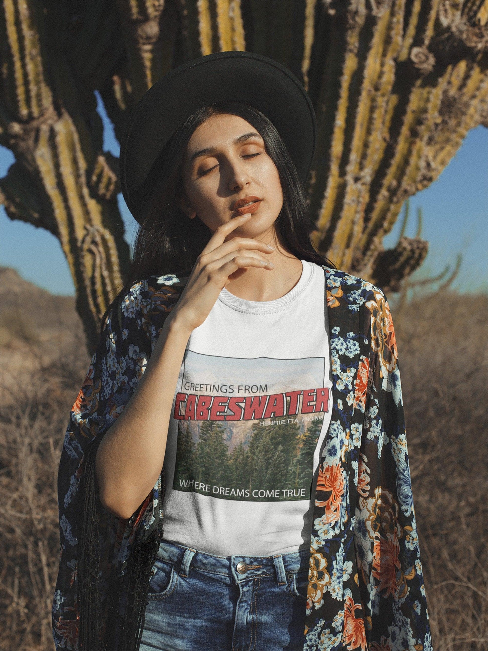 Cabeswater T-Shirt Raven Cycle White Ink and Stories Mockup outdoors