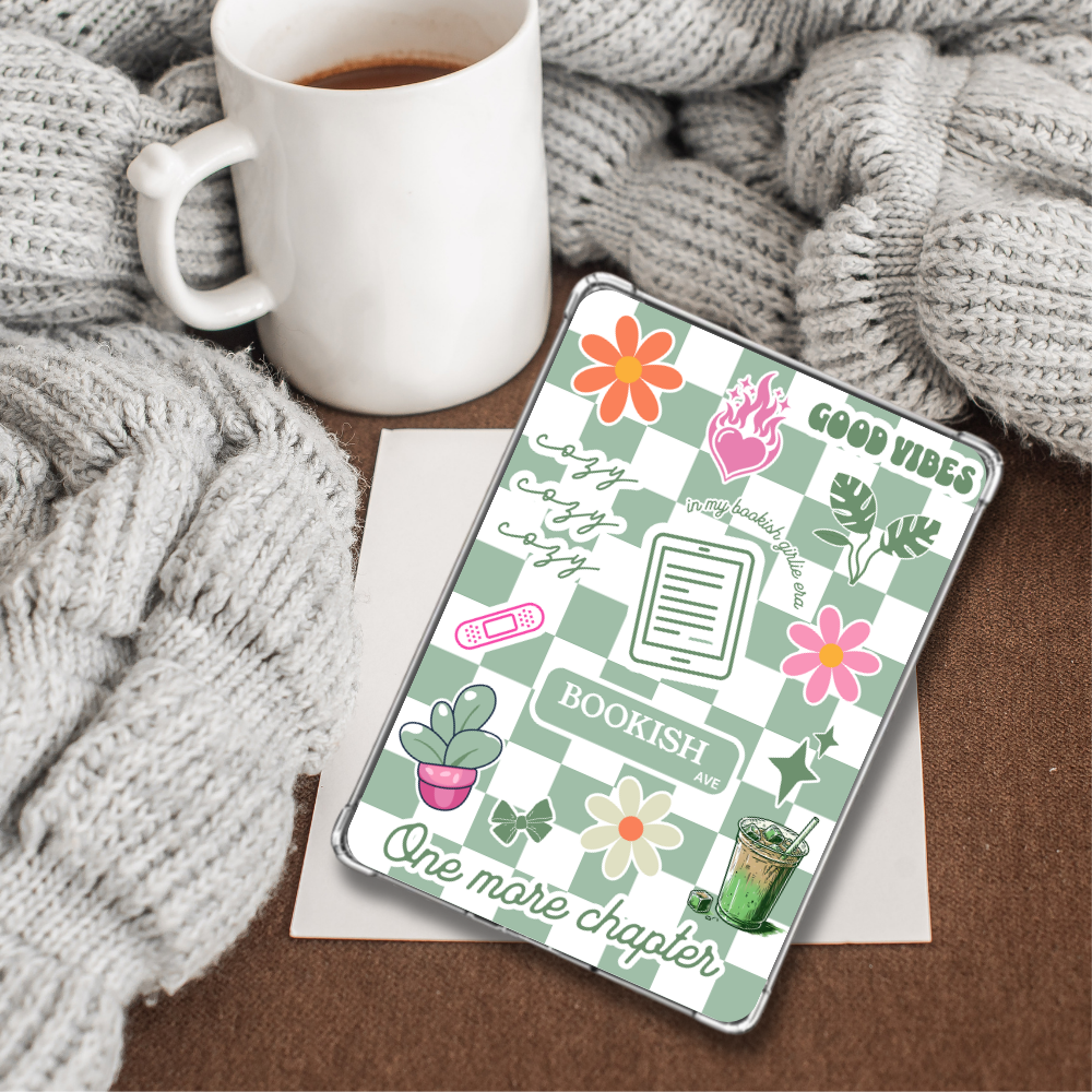 A kindle with a printable insert in the back of a clear case. The insert is a matcha green theme with cute green vibes, like a matcha latte, plants, cozy and good vibes quotes.