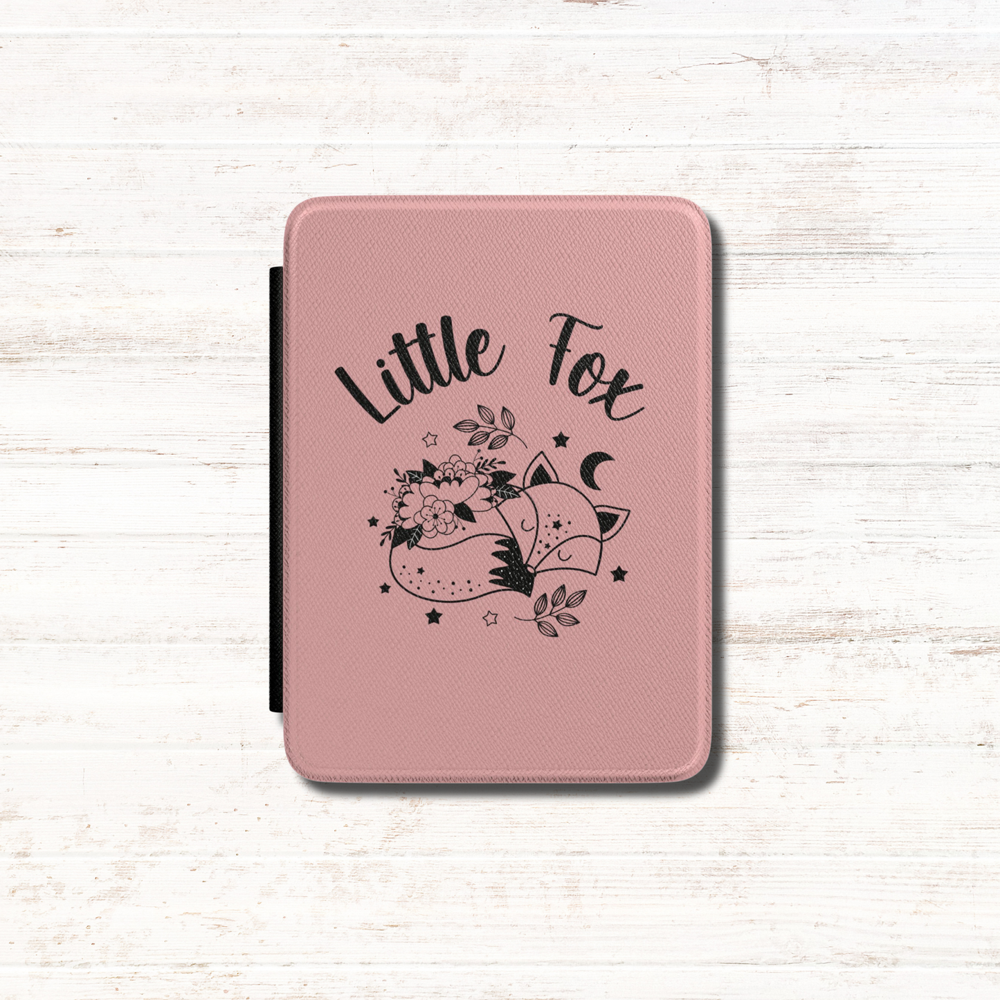 A pink textured Kindle Case Cover- Once Upon a Broken Heart design featuring a black line art illustration of a little fox, flowers, stars, and the words 'Little Fox'. Designed by Starlit Prose Bookish Merch Australia.