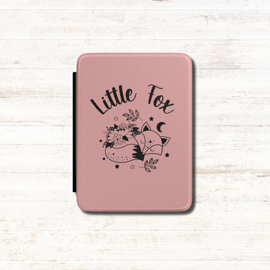 A pink textured Kindle Case Cover- Once Upon a Broken Heart design featuring a black line art illustration of a little fox, flowers, stars, and the words 'Little Fox'. Designed by Starlit Prose Bookish Merch Australia.