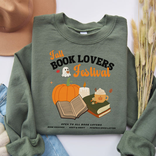 Green sweatshirt with 'Fall Book Lovers Festival' design featuring a pumpkin, books, and a ghost for a fictional Book Lovers Festival. Starlit Prose Bookish Merch Australia