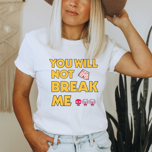 Person wearing a white t-shirt with 'You will not break me' text and skull emojis | Dungeon Crawler Carl Merch | Starlit Prose Bookish Merch Australia