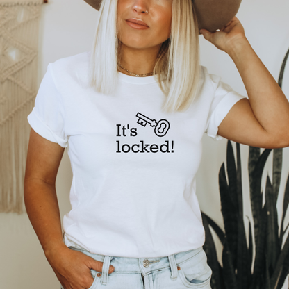 White shirt with text that says "It's locked" with a graphic of a key