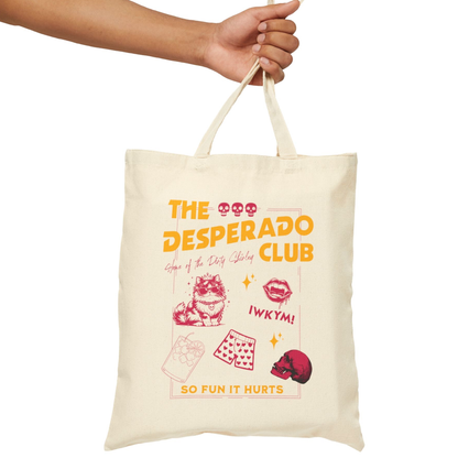 Dungeon Crawler Carl Desperado Club Tote Bag design held by a hand on a white background | Starlit Prose Bookish Merch Australia