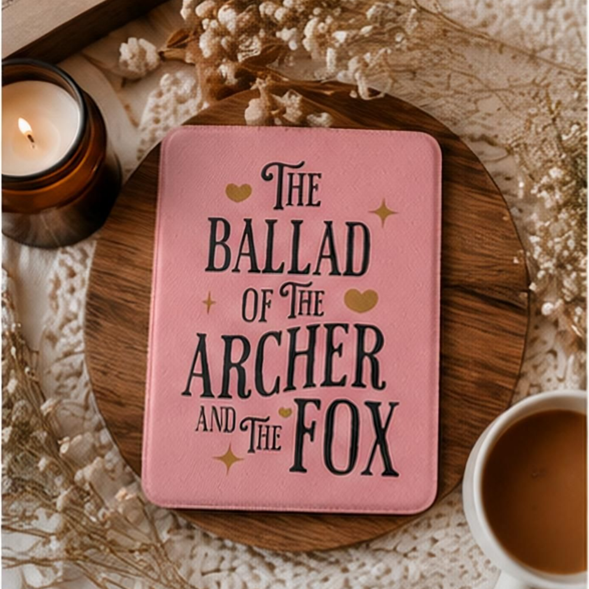 Once Upon a Broken Heart textured pink Kindle Case Cover, it says "The Ballad of the Archer and the Fox" and includes small gold illustrations including stars and hearts. Designed by Starlit Prose Bookish Merch Australia.