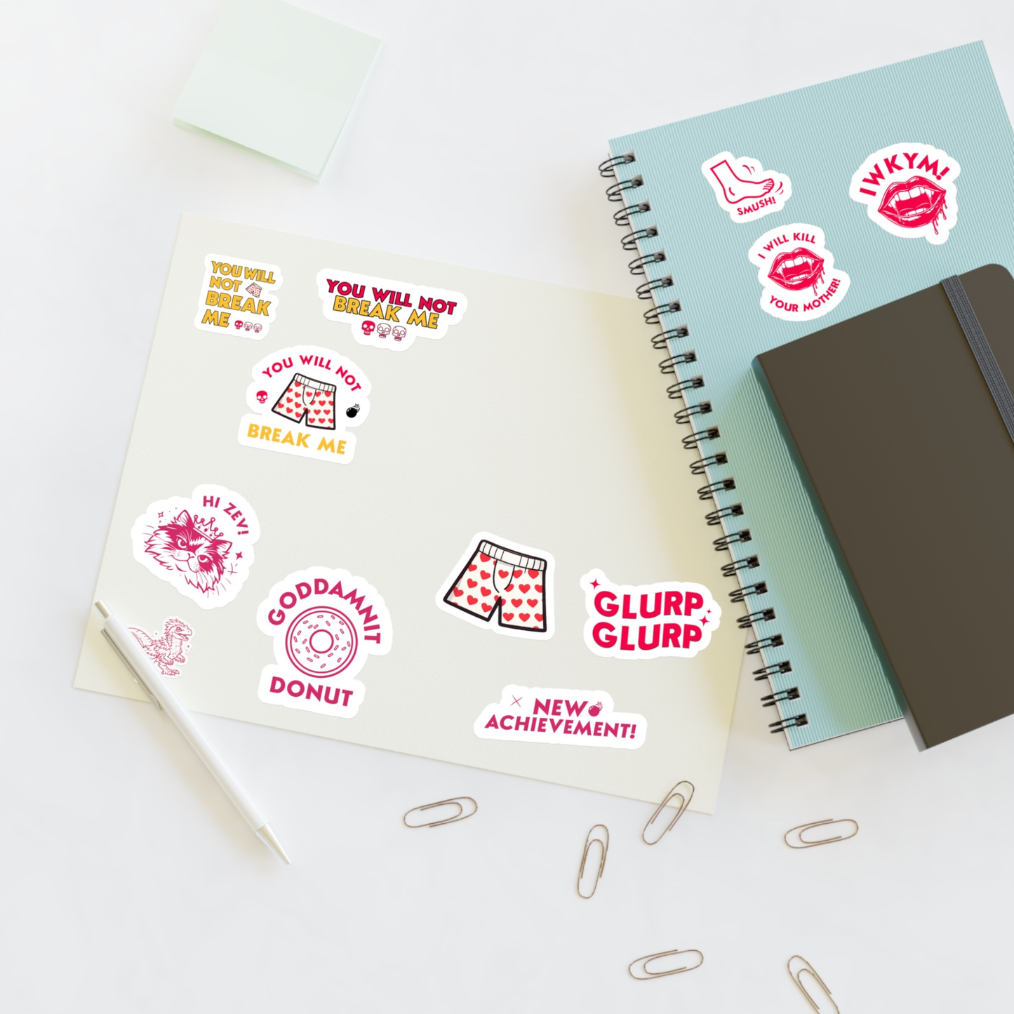 8.5"x 11" Dungeon Crawler Carl Sticker Sheet, stickers shown on notebook | Starlit Prose Bookish Merch Australia