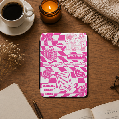 This playful pink Kindle case features a pink and white checkerboard background covered with cute illustrated details — from roses, books and iced lattes to a coquette bow, lips and a tiny bandaged Kindle. The design includes text that says "Romance Ave," "Emotionally Attached to Fictional Characters," "Emotional Support Kindle" and "Self Love Club" for a case that perfectly captures the experience of being a romance reader. Designed by Starlit Prose bookish merch australia.