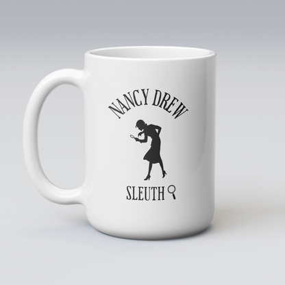 White mug with Nancy Drew Sleuth silhouette design on a gray background