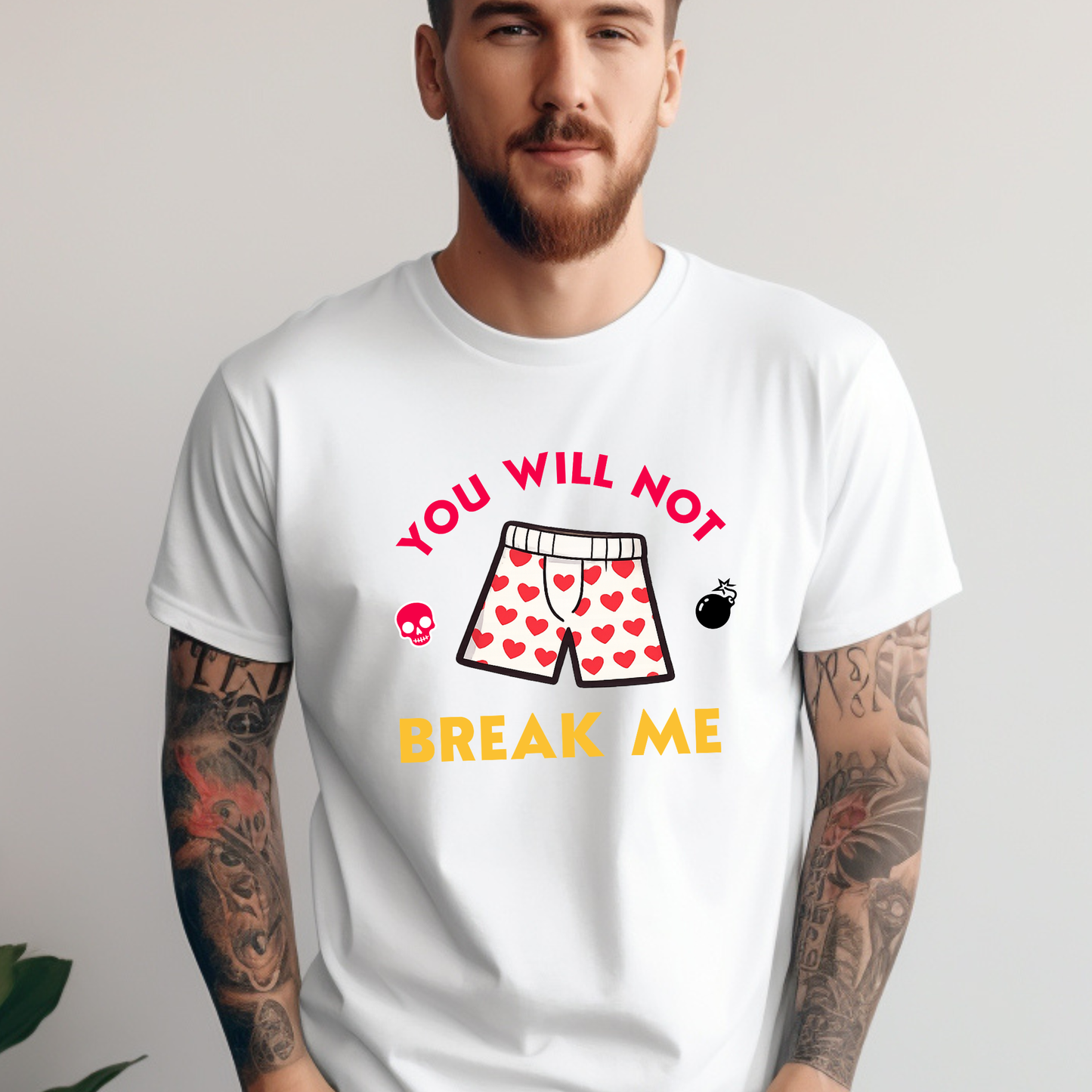 Person wearing a white tshirt that says "You will not break me" quote from Dungeon Crawler Carl book series. Includes graphics of Carl's heart boxer shorts | Starlit Prose Bookish Merch Australia