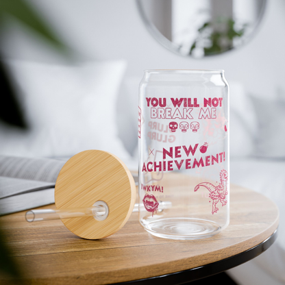 Mockup of the glass sipper cup sitting on a table with the lid and straw option showing.