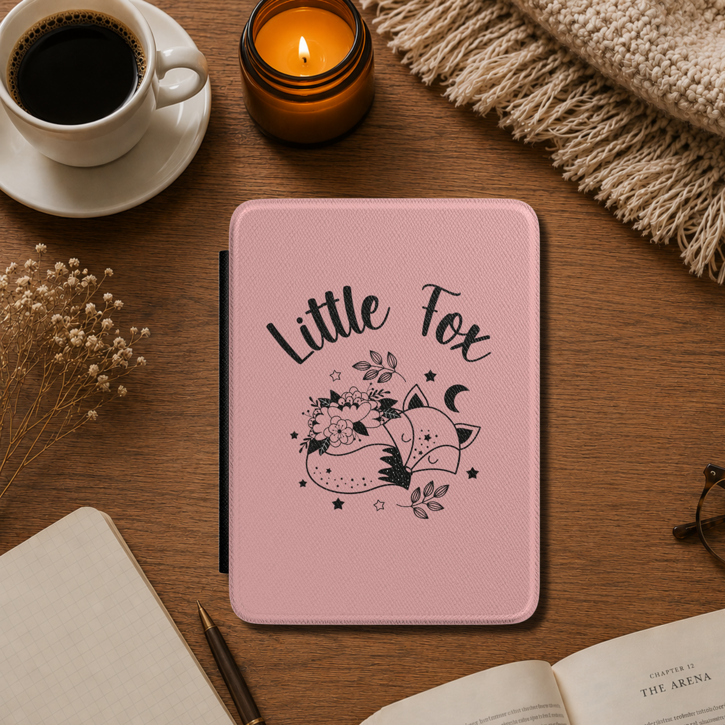 A pink textured Kindle Case Cover- Once Upon a Broken Heart design featuring a black line art illustration of a little fox, flowers, stars, and the words 'Little Fox'. Designed by Starlit Prose Bookish Merch Australia.