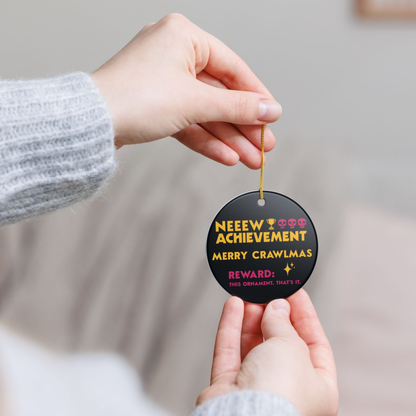 Bookish Ornament - Dungeon Crawler Carl themed round black ornament with bold yellow text that says "NEW ACHIEVEMENT, MERRY CRAWLMAS" in bold pink text it says "Reward, this ornament. Thats it" with a star illustration and trophy with 3 pink skulls. Designed by Starlit Prose Bookish Merch Australia.