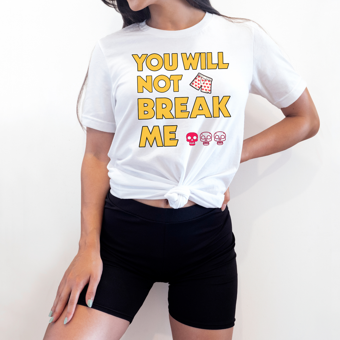 Person wearing a white t-shirt with 'You will not break me' text and skull emojis | Dungeon Crawler Carl Merch | Starlit Prose Bookish Merch Australia