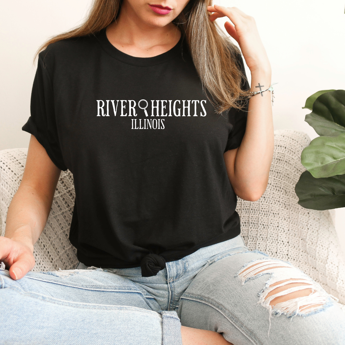 Black shirt that says "River Heights Illinois"
