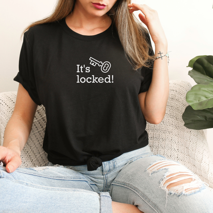 black shirt with text that says "It's locked" with a graphic of a key