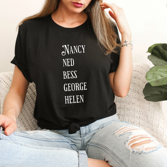 Black shirt with the names of The Clue Crew