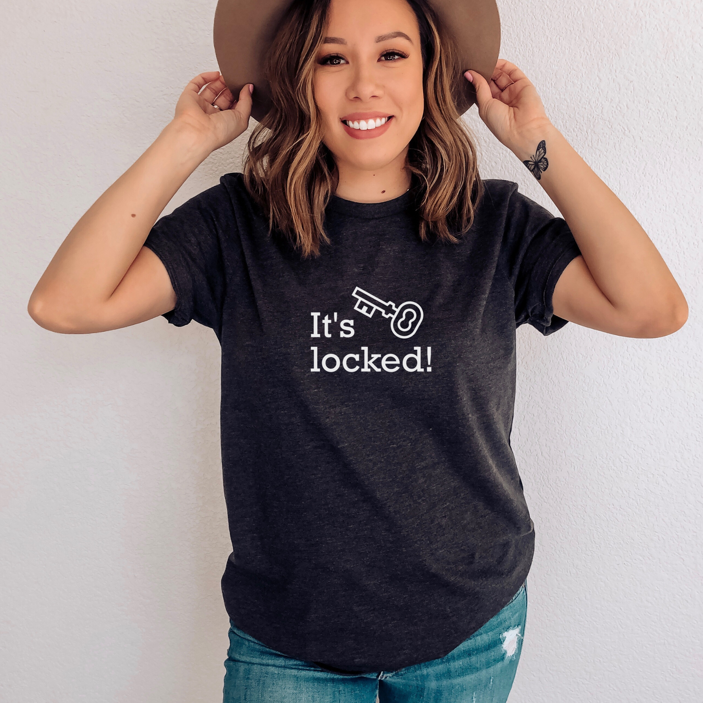 dark grey heather shirt with text that says "It's locked" with a graphic of a key