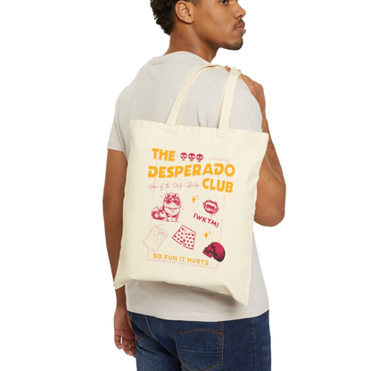 Dungeon Crawler Carl Desperado Club Tote Bag design held by a hand on a white background | Starlit Prose Bookish Merch Australia