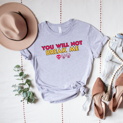 Person wearing a Grey Heather t-shirt with 'YOU WILL NOT BREAK ME' text design inspired by Dungeon Crawler Carl | Starlit Prose Bookish Merch Australia