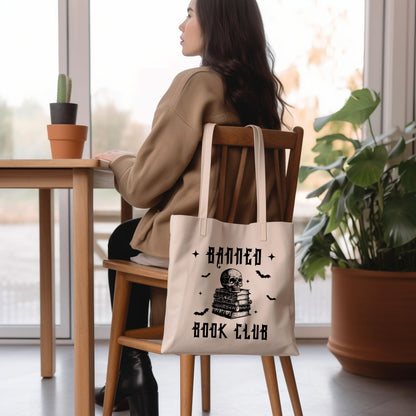Banned Book Club Tote Bag hanging up on chair Halloween Mockup| Bookish Halloween | Ink & Stories Bookish Merch Australia