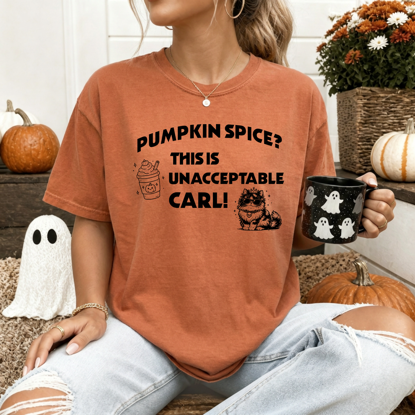A woman wearing a Yam Comfort Colors t-shirt with the text 'PUMPKIN SPICE? THIS IS UNACCEPTABLE CARL!' and a pumpkin spice latte, with Princess Donut  illustration. Designed by Starlit Prose Bookish merch Australia