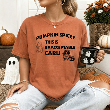 A woman wearing a Yam Comfort Colors t-shirt with the text 'PUMPKIN SPICE? THIS IS UNACCEPTABLE CARL!' and a pumpkin spice latte, with Princess Donut  illustration. Designed by Starlit Prose Bookish merch Australia