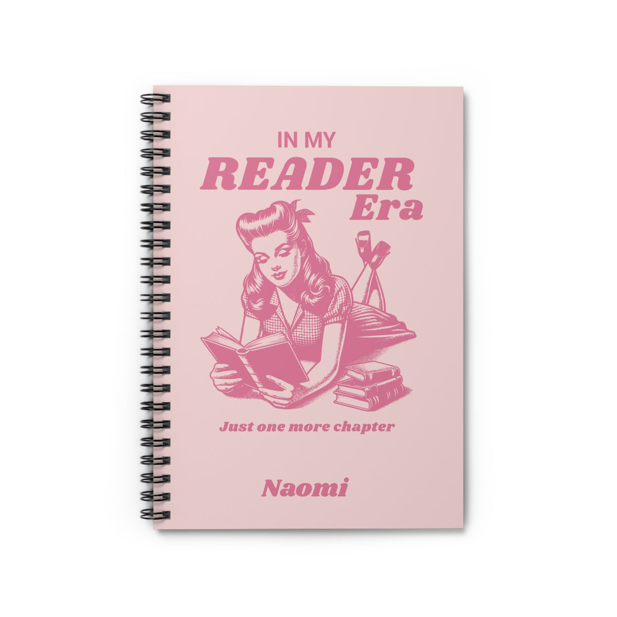 This cute bookish personalised spiral notebook features a soft light pink background, a vintage-inspired pin-up girl reading a book and the phrases "In My Reader Era" and "Just One More Chapter." A personalised section allows you to add the recipient's name, turning an already bookish design into a thoughtful gift made especially for them. Designed by Starlit Prose Bookish Merch Australia.