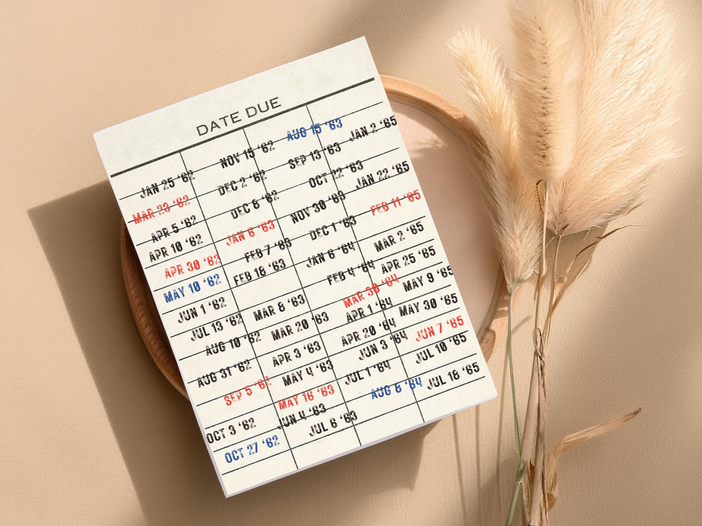 Mockup of the Vintage Library Card Digital print on a wooden board