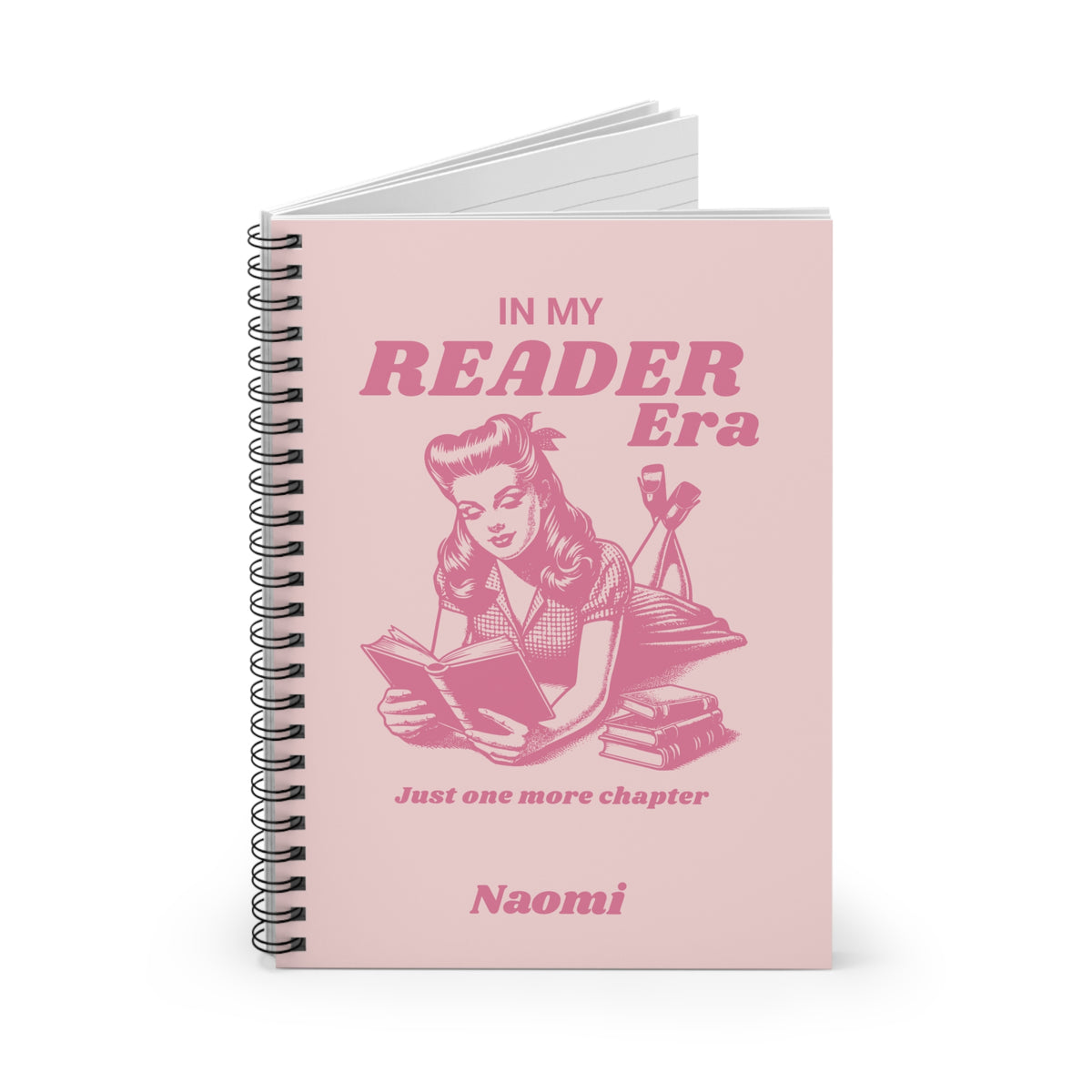 This cute bookish personalised spiral notebook features a soft light pink background, a vintage-inspired pin-up girl reading a book and the phrases "In My Reader Era" and "Just One More Chapter." A personalised section allows you to add the recipient's name, turning an already bookish design into a thoughtful gift made especially for them. Designed by Starlit Prose Bookish Merch Australia.