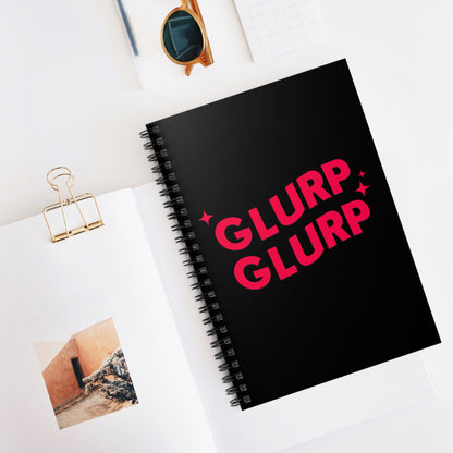 A black Dungeon Crawler Carl bookish spiral notebook, it has red text that says "Glurp Glurp" bold with some accent stars. Designed by Starlit Prose Bookish Merch Ausralia.