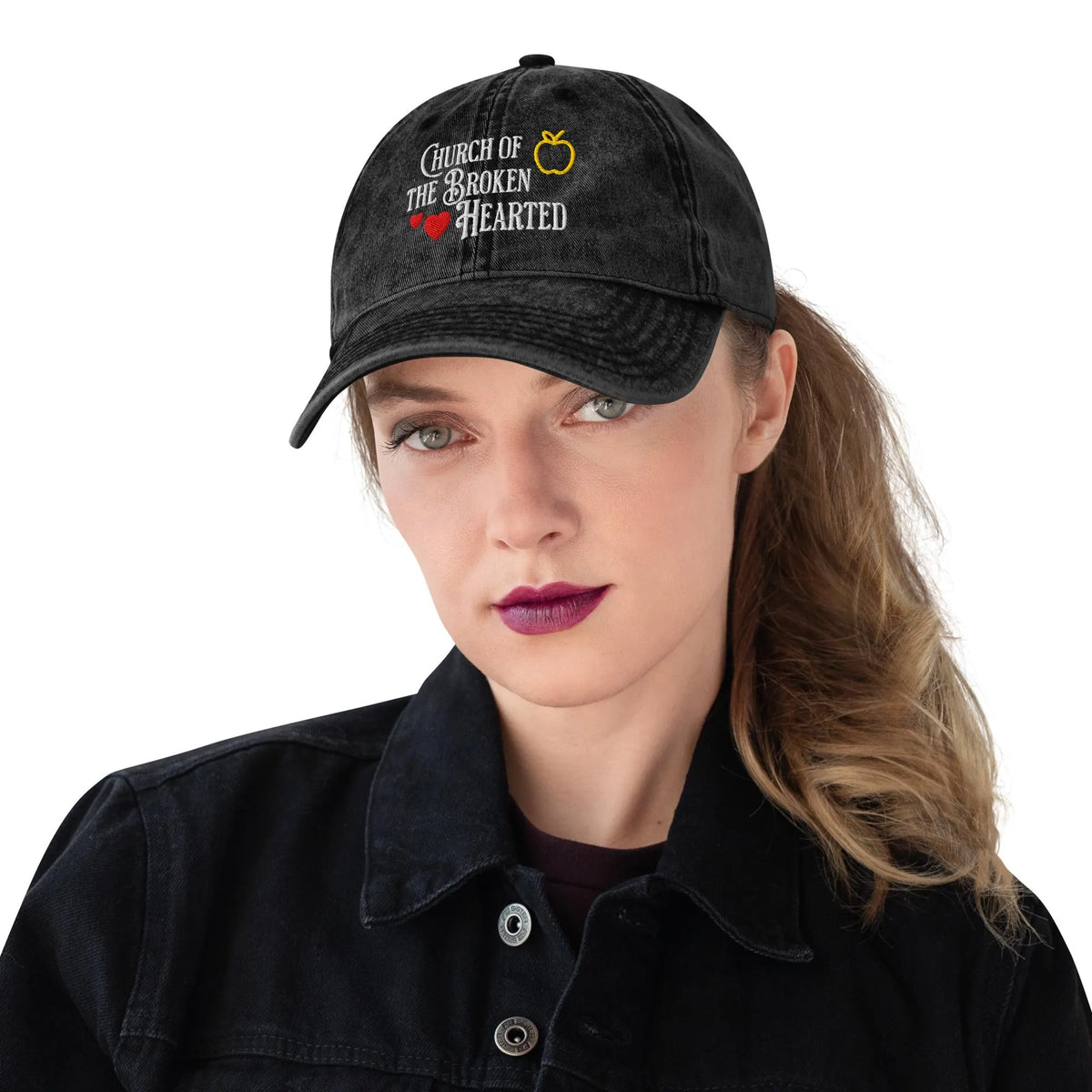 Once Upon a Broken Heart embroidered hat , distressed Vintage style hat features text that says “Church of the Broken Hearted”, with a delicate gold apple outline, and tiny red hearts. Designed by Starlit Prose Bookish Merch Australia.