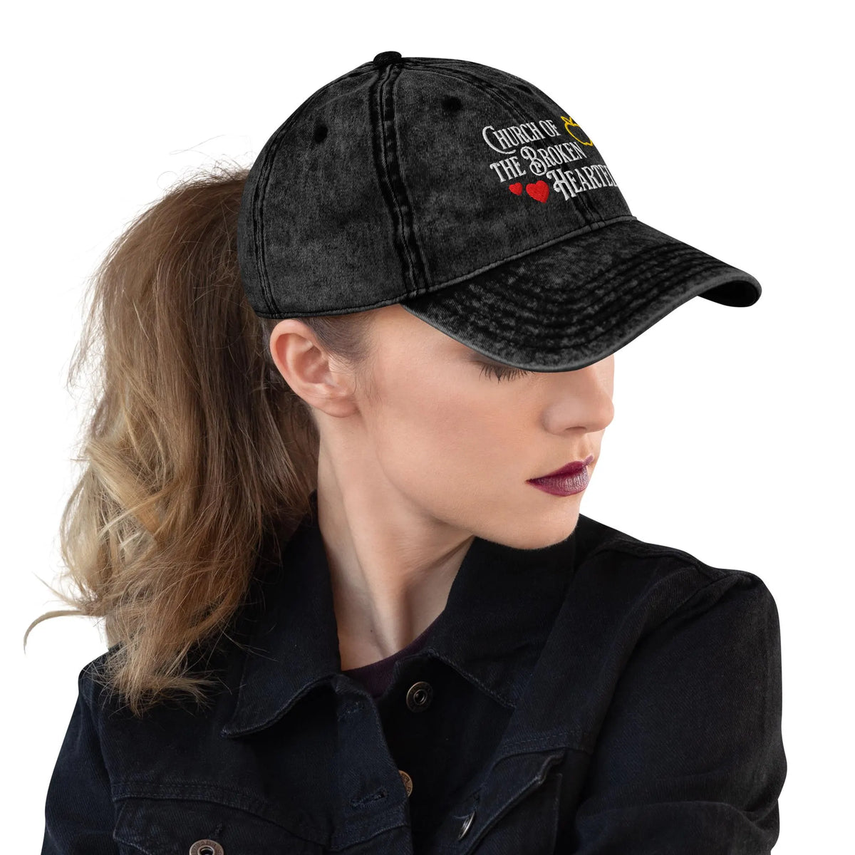 Once Upon a Broken Heart embroidered hat , distressed Vintage style hat features text that says “Church of the Broken Hearted”, with a delicate gold apple outline, and tiny red hearts. Designed by Starlit Prose Bookish Merch Australia.