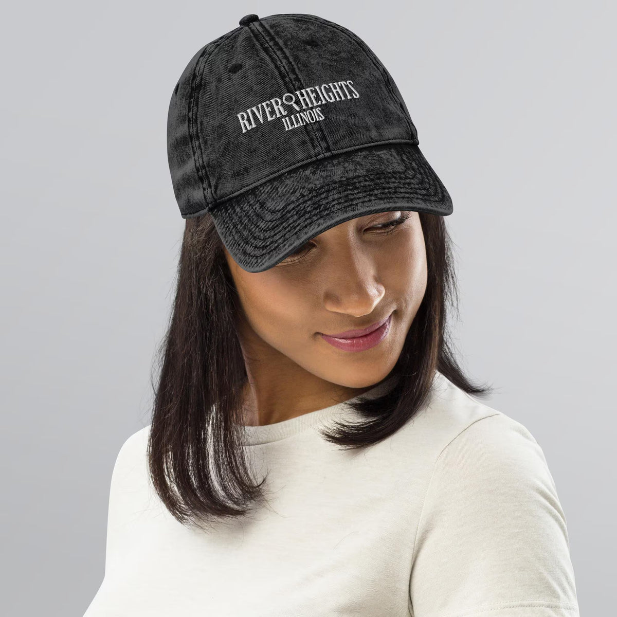 Nancy Drew vintage distressed style embroidered cap features “River Heights, Illinois” alongside a magnifying glass. Designed by Starlit Prose Bookish Merch Australia.