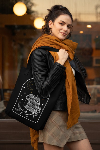 Woman in scarf wearing the Bookish Fantasy Girl Tote Bag
